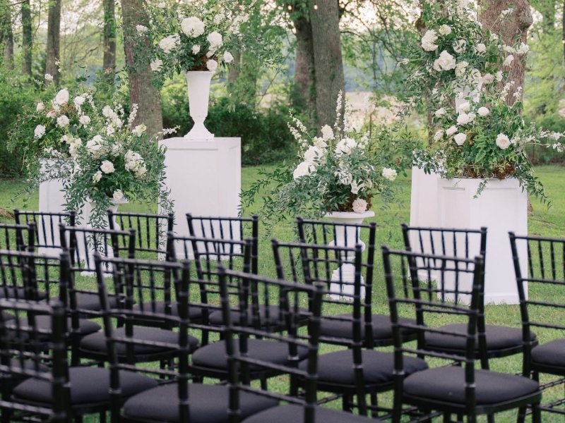 Elegant Outdoor White Wedding: Seamless Setup with Black Chiavari Chairs & One-Stop Furniture Solutions