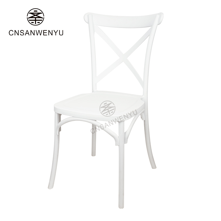 White plastic cross back chair.jpg